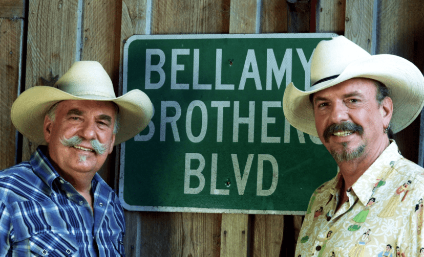 2 Men with Bellamy Brothers Boulevard Sign